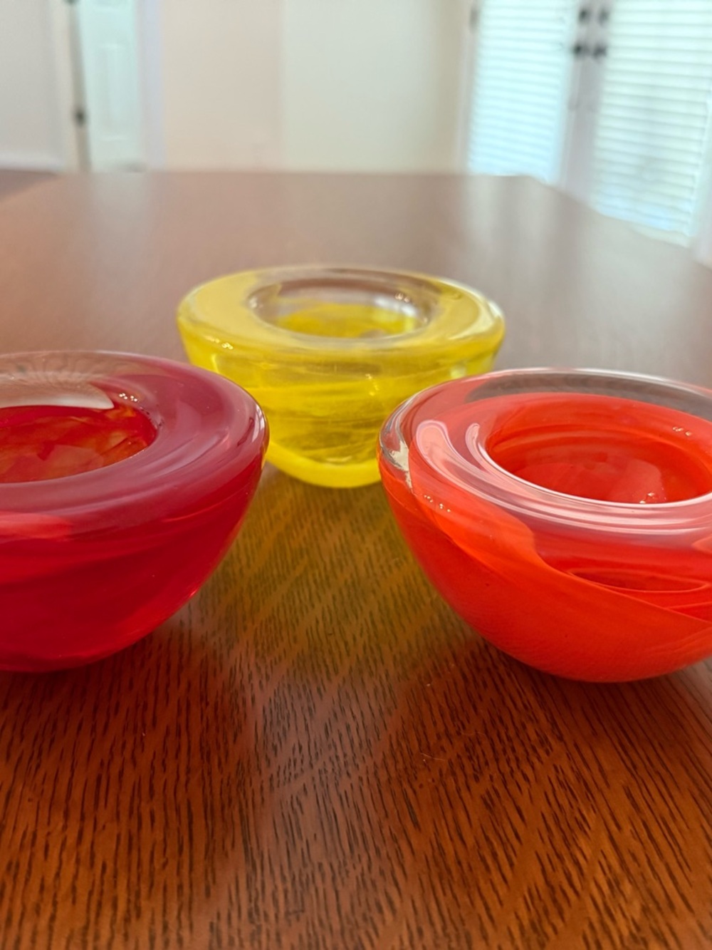 Kosta Boda Trio of Red, Orange and Yellow Glass Votives
